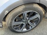 a close up of a tire on a car ' s rim
