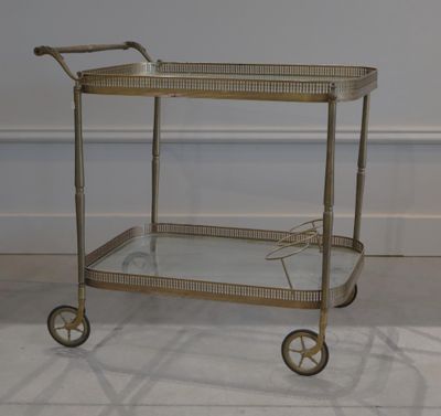 Desserte roulante en laiton. XXe siècle.