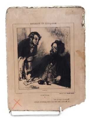 un vieux livre sur lequel figure l'image d'un homme et d'une femme assis à une table
