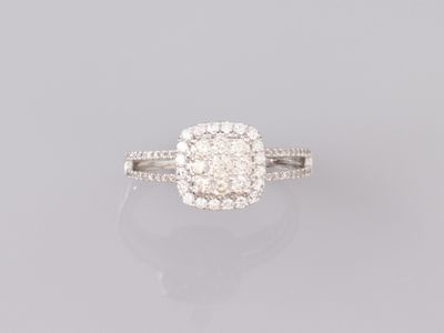 a diamond and white gold ring