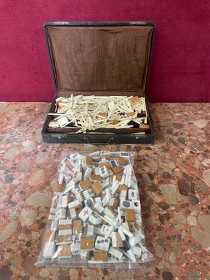 a suitcase full of toothbrushes and toothpaste on a table