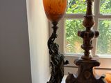 a lamp that is sitting on a window sill