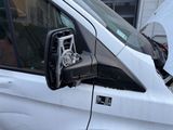 a white van that has a broken door handle on it