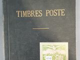 a black book with a picture of a town on it