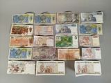 many different types of money that are on the table