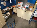 an image of a work area with a desk and a chair