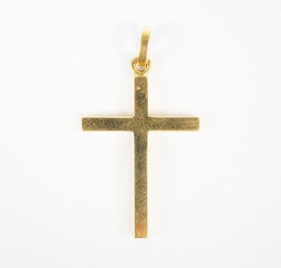 a gold cross pendant on a white background