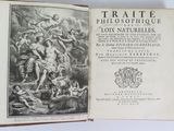 an old book with a picture of a man and a woman on it