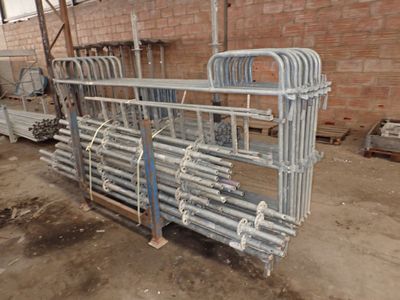 a large metal rack with a bunch of pipes attached to it