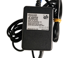 an image of a power adapter for a laptop with a cord