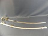 two swords with a gold handle and a silver handle