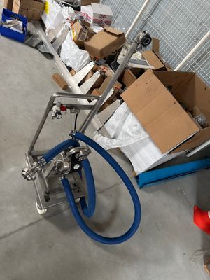 a cart with a bunch of boxes on it in a garage