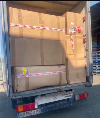 a truck that has a lot of boxes in the back