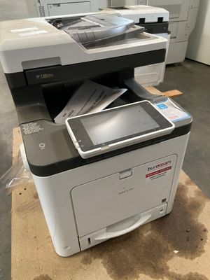 a printer that is sitting on top of a table