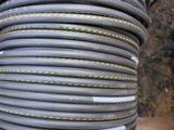 a lot of hoses that are stacked on top of each other