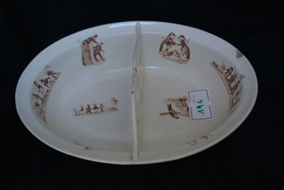 a plate with a picture of a man and a woman on it