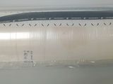 a plastic bag that has a toaster inside of it