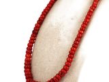 red coral beaded necklace on a mannequin mannequin mannequin mannequin mannequin mannequin mannequin mannequin mann