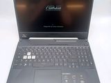 a laptop computer that is sitting on a table