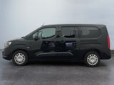 a picture of a black van parked in a parking lot