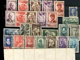 several different types of stamps are displayed on a black surface