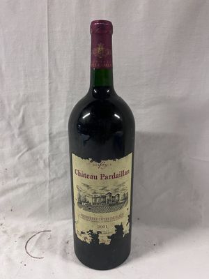 a bottle of wine that is sitting on a table