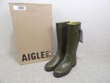 an image of a pair of green rain boots next to a box