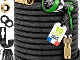 a close up of a hose with a hose gun and other items