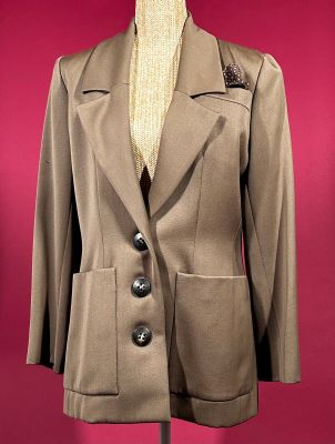 jacket on a mannequin stand on a red background