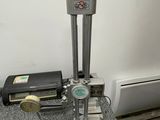 a machine that is sitting on a counter next to a heater