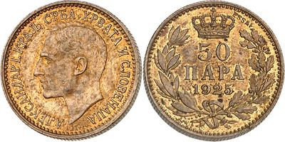 a gold sovereign coin with a crown on top of it