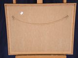 a picture of a wooden easel with a painting on it