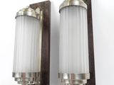 pair of art deco wall sconces in the style of person