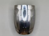 a close up of a metal object on a white surface