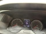 a picture of a dashboard of a car with gauges and numbers
