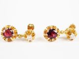 une paire de boucles d'oreilles en rubis et diamants