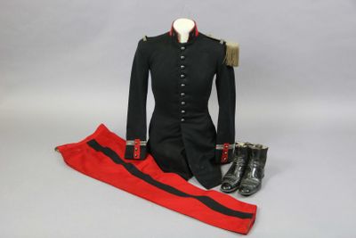 an image of a uniform and boots on a mannequin