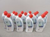 six bottles of toilet cleaner are lined up on a table