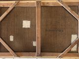 an old wooden frame with a picture of a man and a woman