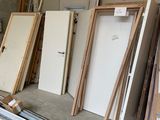 many different types of doors and frames in this garage