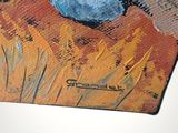 a picture of a painting of a cat on a table
