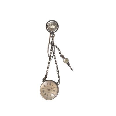 an image of a close up of a clock on a chain