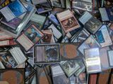 many different types of cards scattered together on the floor