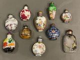 a lot of small vases that are sitting on a table