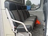 a seat in the back of a van that is empty