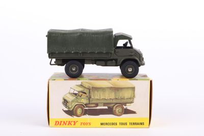 a toy truck that is sitting on top of a box