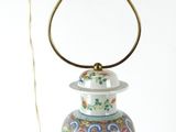 a lamp that is sitting on a table with a cord
