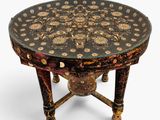 an image of a table with a black and gold design on it