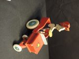 a toy airplane that is attached to a wall