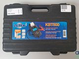 an image of a black case with a charger on top of it